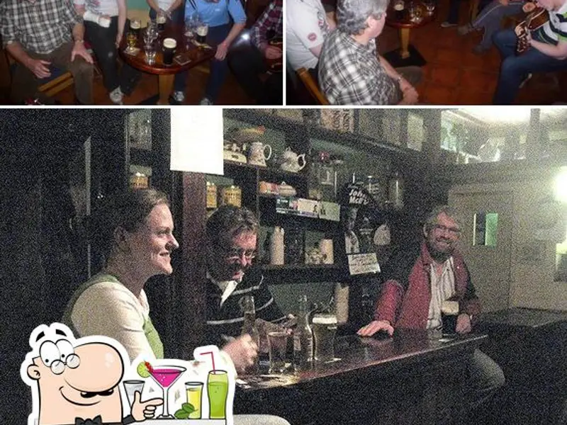 The bar counter at Charley Farrelly's with original grocery shelves behind
